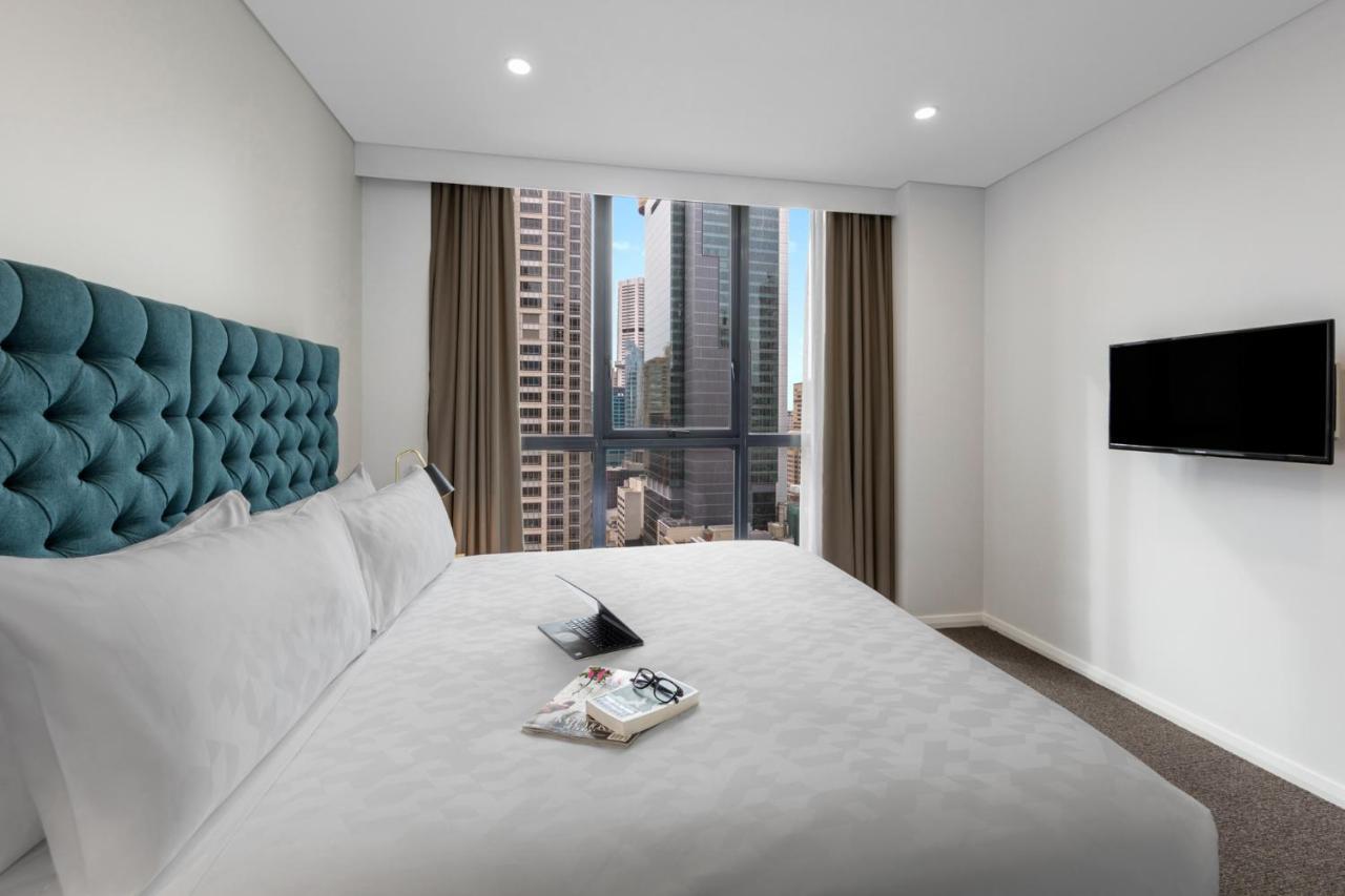 Meriton Suites Pitt Street, Sydney Ngoại thất bức ảnh A bedroom at the hotel
