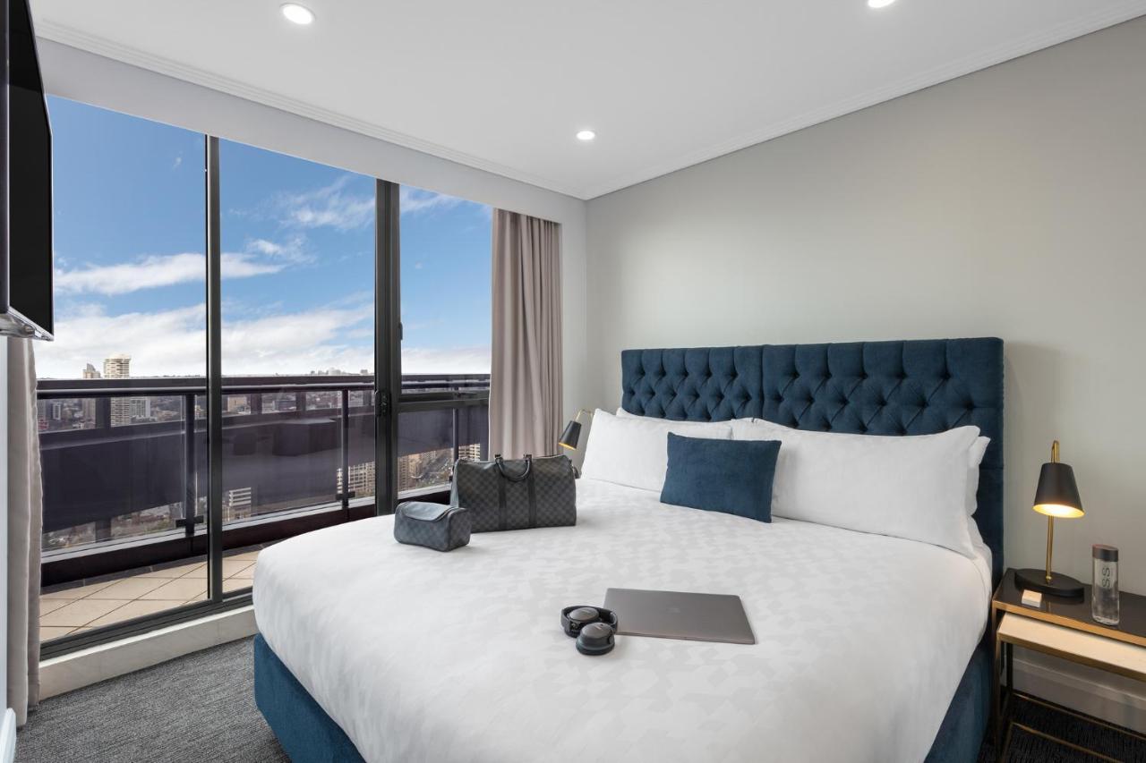 Meriton Suites Pitt Street, Sydney Ngoại thất bức ảnh A bedroom at the hotel