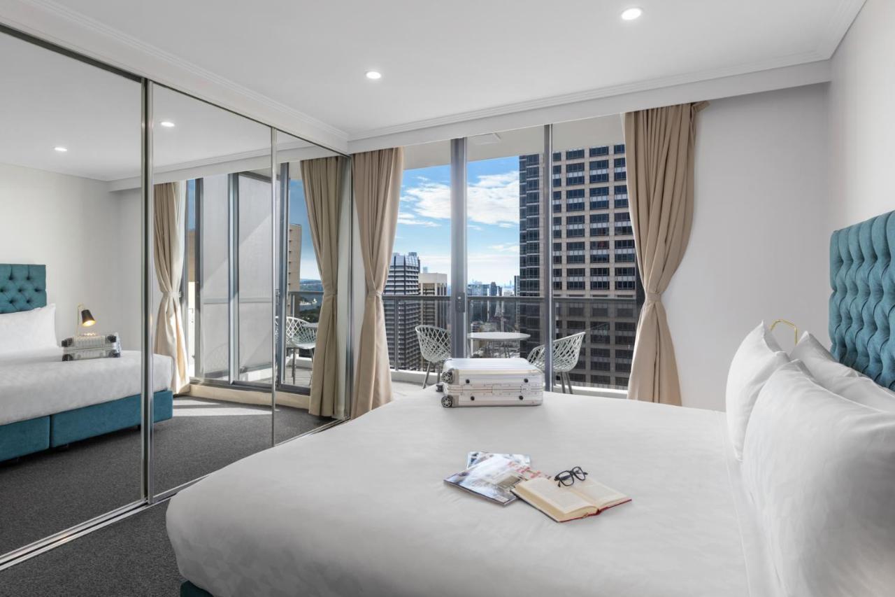 Meriton Suites Pitt Street, Sydney Ngoại thất bức ảnh A bedroom at the hotel