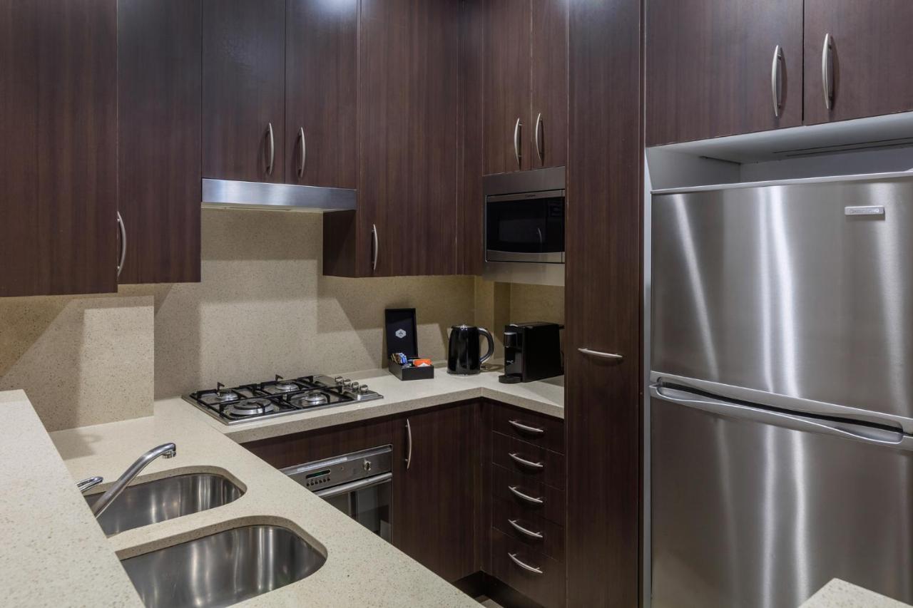 Meriton Suites Pitt Street, Sydney Ngoại thất bức ảnh A typical kitchen in a serviced apartment